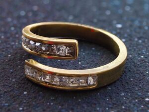 Kizara Helix Infinity Baguette Ring – Anti-Tarnish Latest Gold CZ Wrap