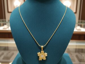 Stunning Gold Starburst Flower Pendant Necklace with CZ Center